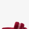 Alexis sandaler med fuskpäls och metallisk signaturlogotyp