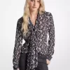 Blommig Georgetteblus med knytringning Blommig Georgetteblus med knytringning