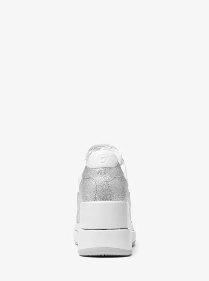 Emmy glitterutsmyckade lädersneakers med kilklack