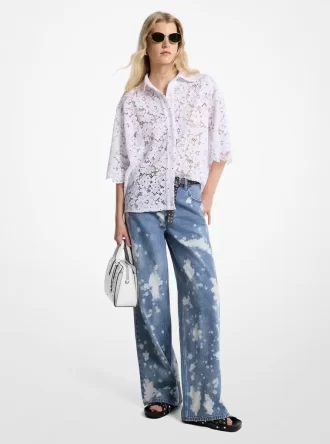 Handstänkta blekta denimjeans med vida ben