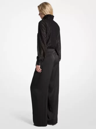 Jumpsuit i jacquard och satin med metalliska klämmor och knytband