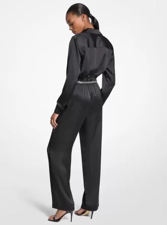 Jumpsuit med långa ärmar i satin och skärp