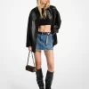 Minikjol i sliten denim