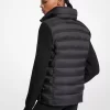 Quiltad nylon- och stickad jacka
