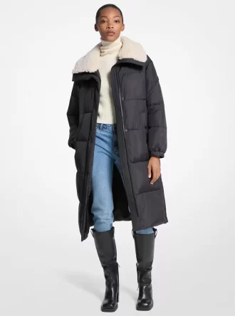 Quiltad täckjacka med fuskpälskant Quiltad täckjacka med fuskpälskant