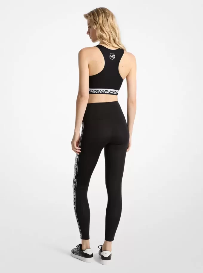 Stretchiga stickade leggings med hög midja och logotyptejp Stretchiga stickade leggings med hög midja och logotyptejp