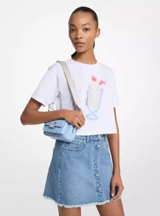 T-shirt med paljettmönster och grafisk design
