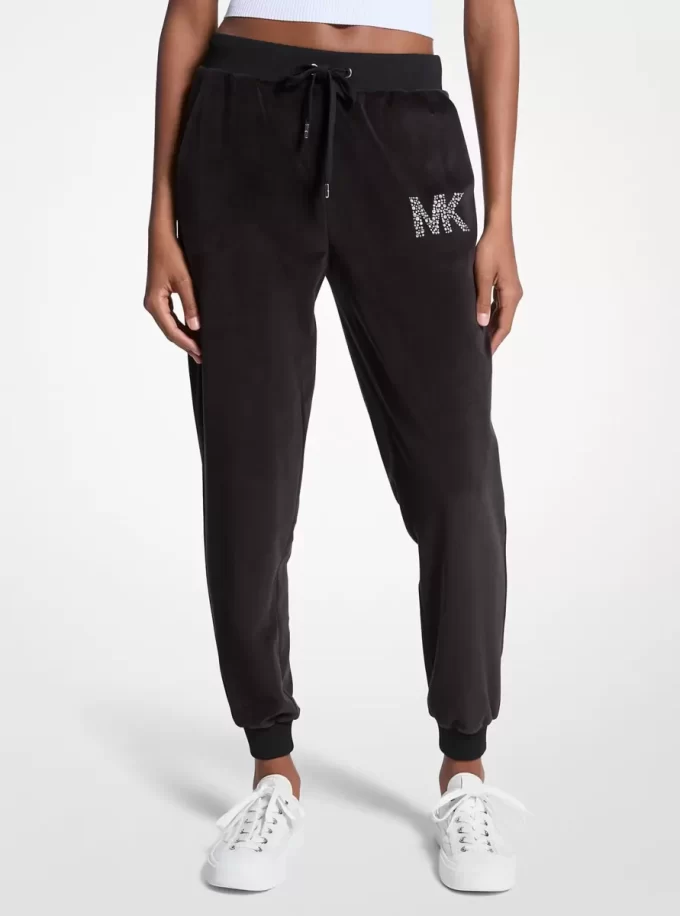 Utsmyckade joggingbyxor i velour med logotyp