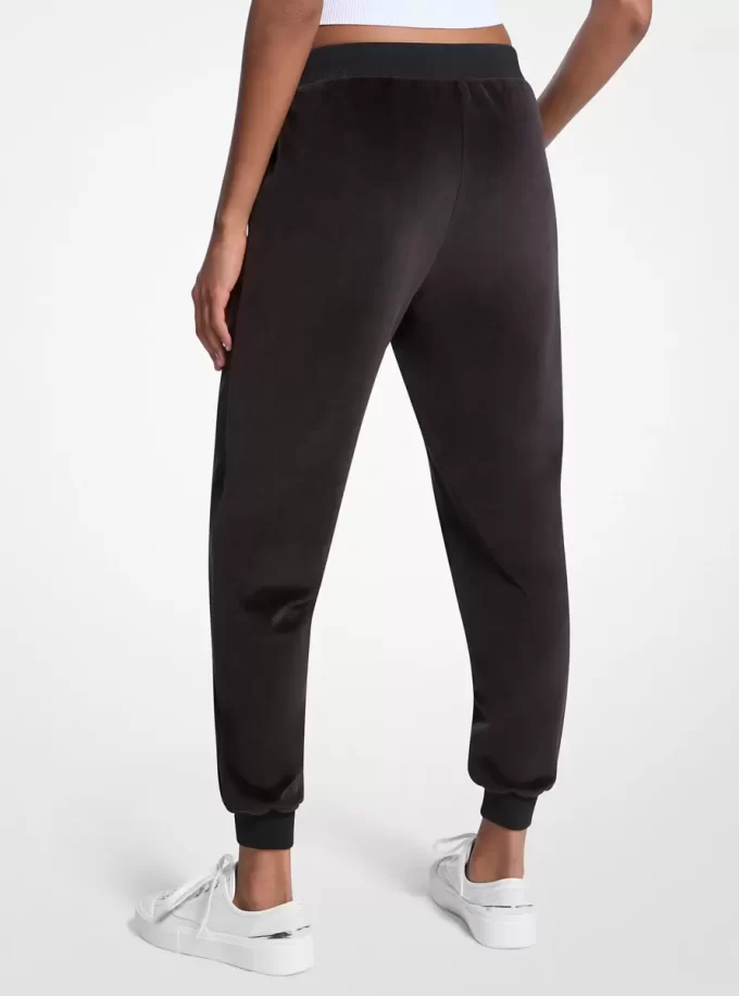 Utsmyckade joggingbyxor i velour med logotyp
