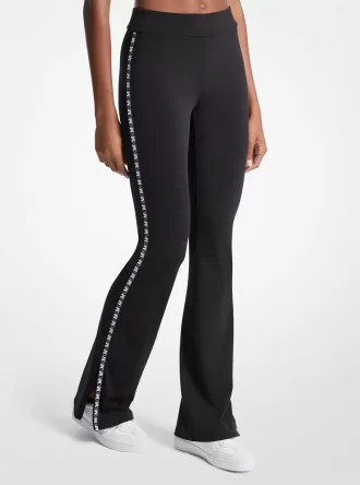 Utsvängda leggings med logotyptejp