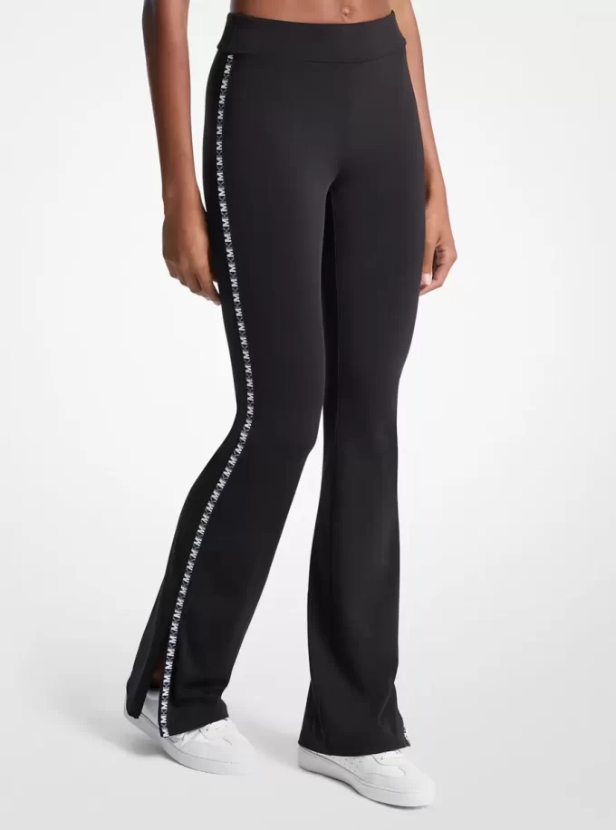 Utsvängda leggings med logotyptejp