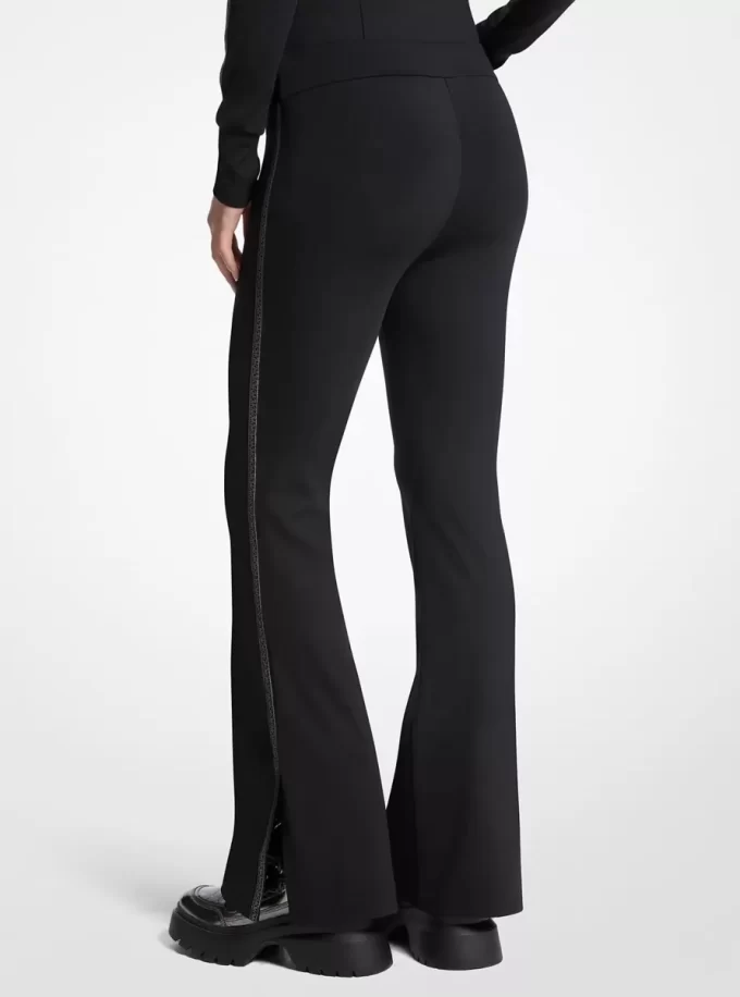 Utsvängda leggings med logotyptejp och stretchig nylon Utsvängda leggings med logotyptejp och stretchig nylon